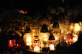 Candle lights on graves in cemetery in Poland on All SaintsÃ¢â¬â¢ Day or All SoulsÃ¢â¬â¢ Day or Halloween or Zaduszk